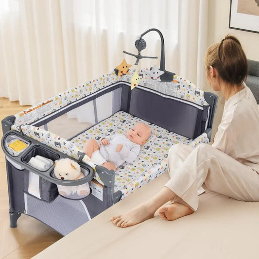 5-in-1 Baby Bedside Sleeper – Bassinet, Diaper Changer, Mattress & Carry Bag with Music Box and Hanging Toys